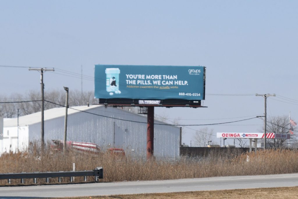 Groups billboard in a rural location